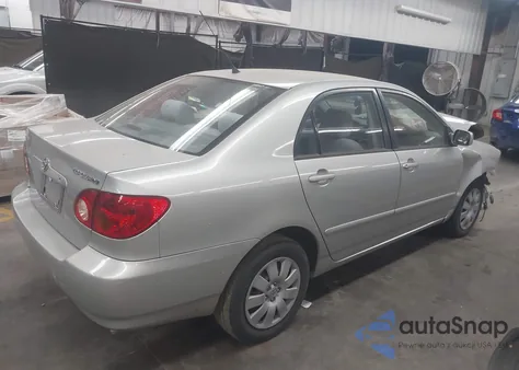 2003 Toyota Corolla Le z USA, uszkodzony, nr VIN 2T1BR32E43C022179